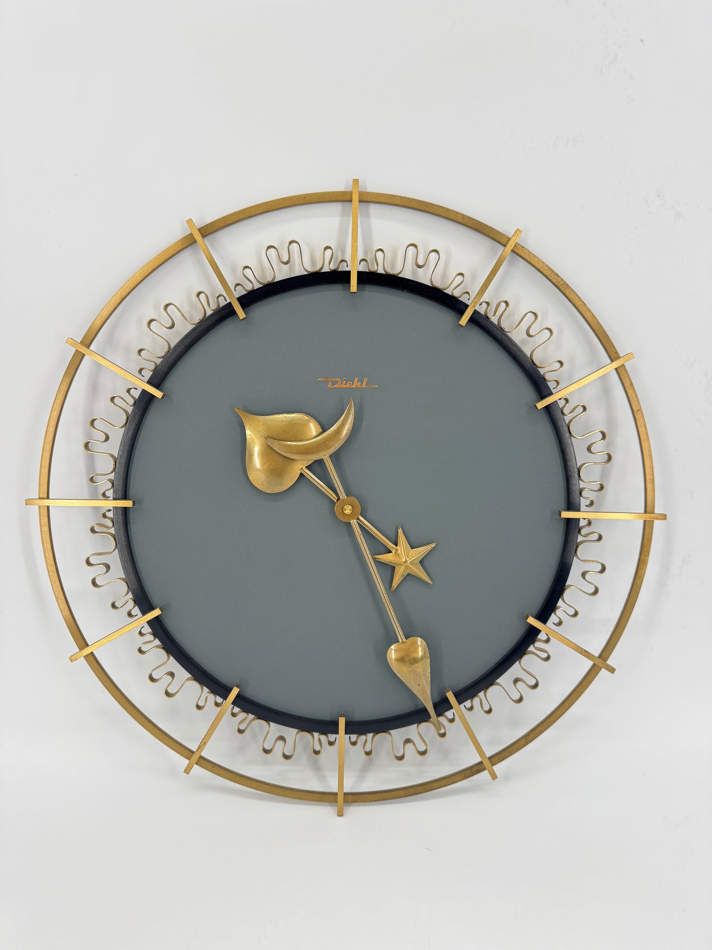 Diehl, Wanduhr, Sunburst, Schmiedeeisen