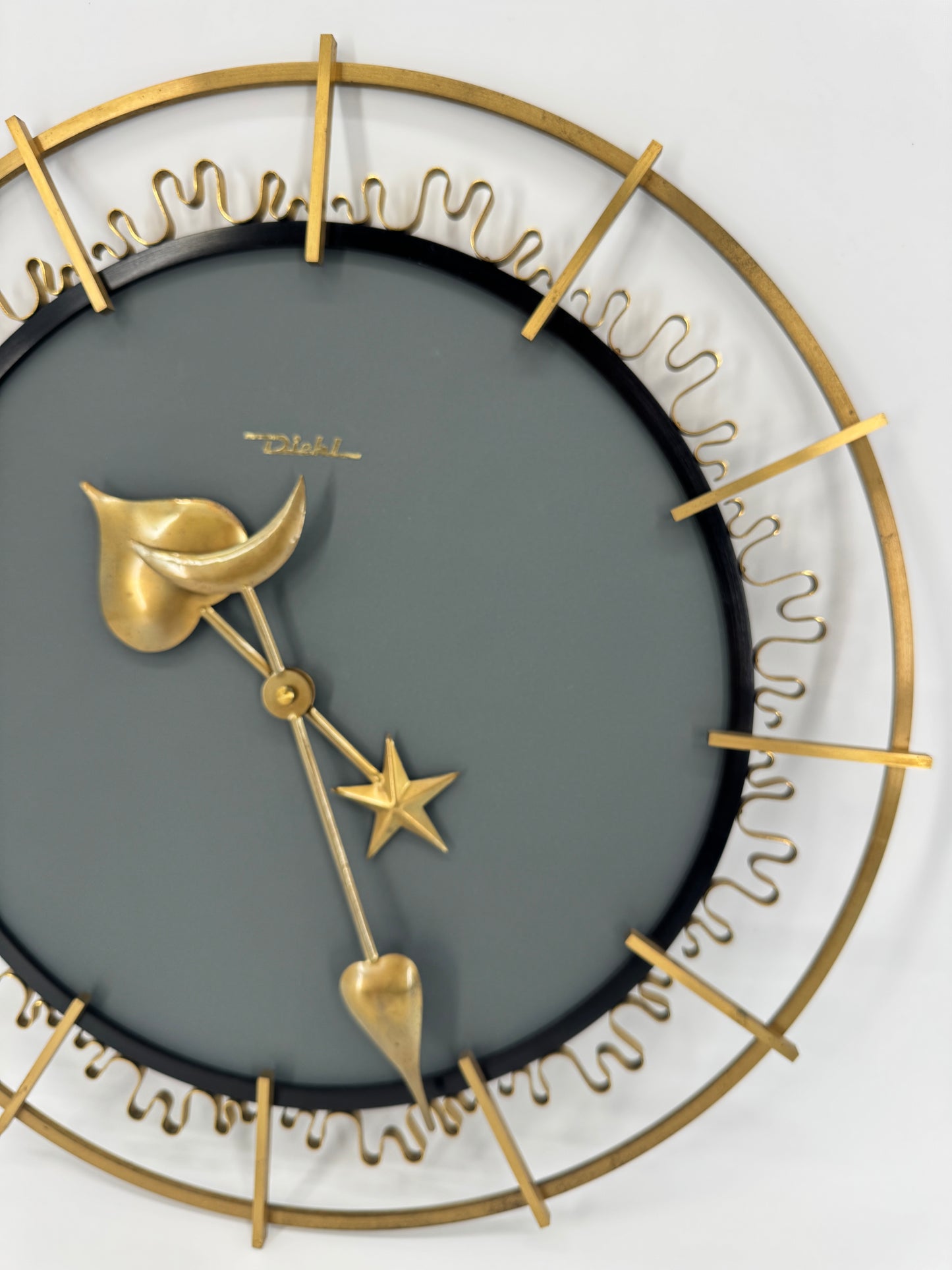 Diehl, Wanduhr, Sunburst, Schmiedeeisen