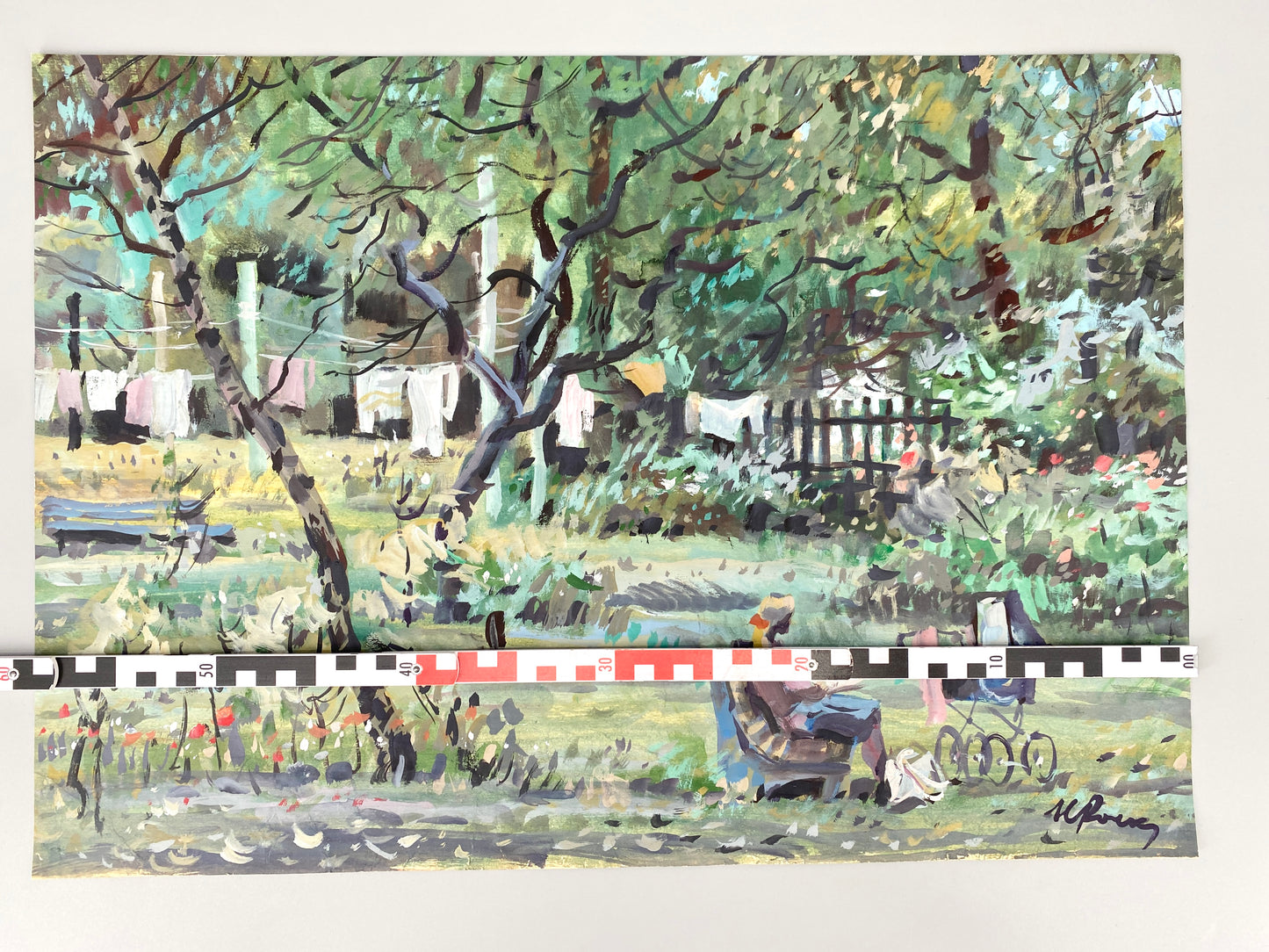Frau mit Kinderwagen liest im Garten. Aquarell