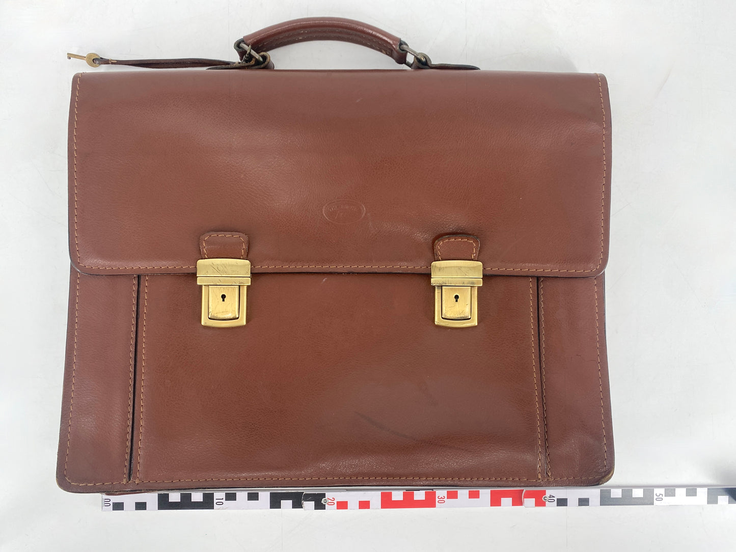 Leder- und Aktentasche, hochwertig. Verschliessbar, mit Tragegriff und vielen Taschen.