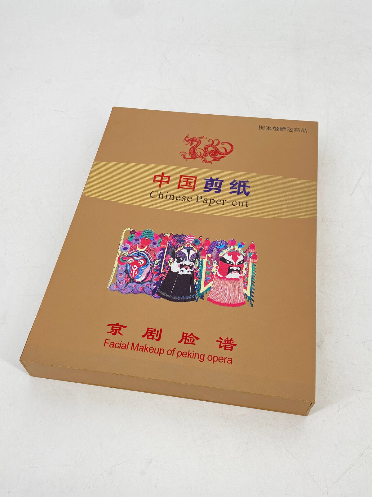 * BUCH CHINESE PAPER CUT FACIAL MAKEUP OF PEKING OPERA BEIJING MARK