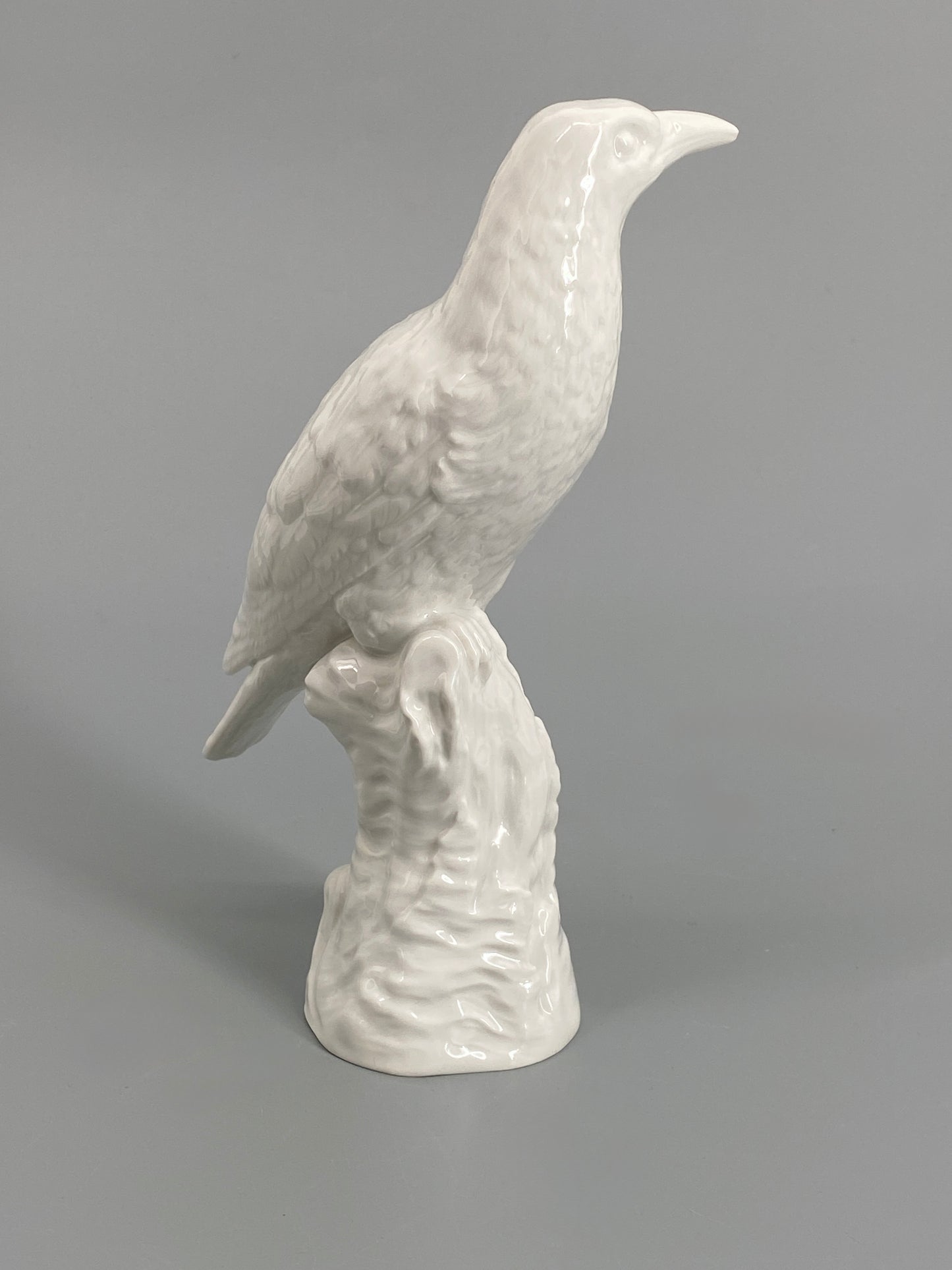 Porzellanvogel "Pirol" von KPM mit weißer Grundglasur, bezeichnet, 1. Wahl