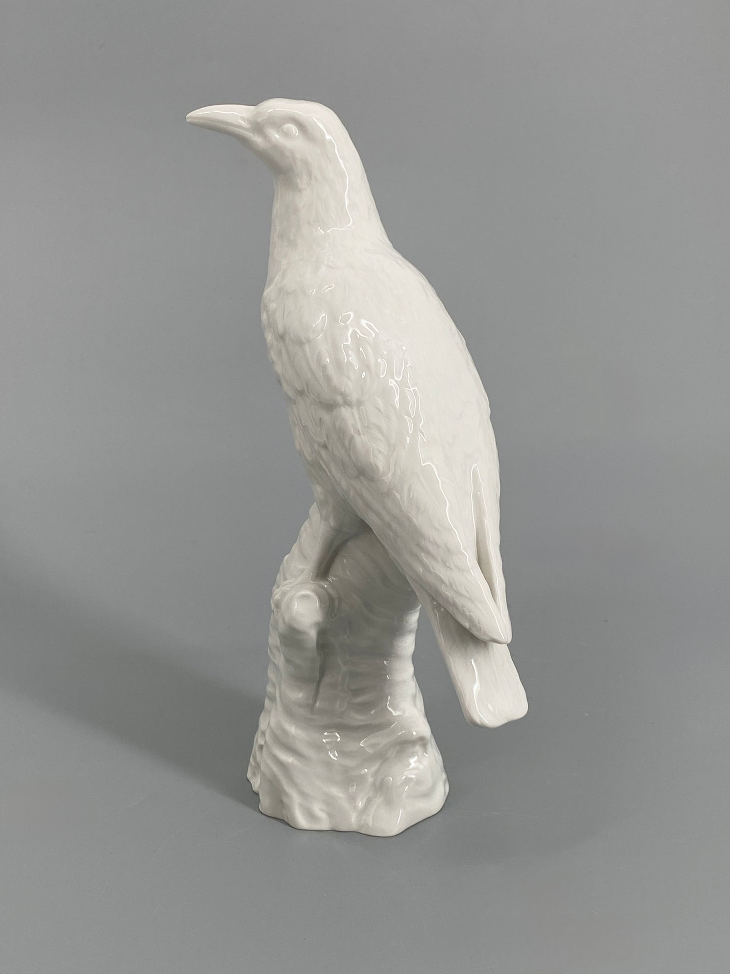 Porzellanvogel "Pirol" von KPM mit weißer Grundglasur, bezeichnet, 1. Wahl