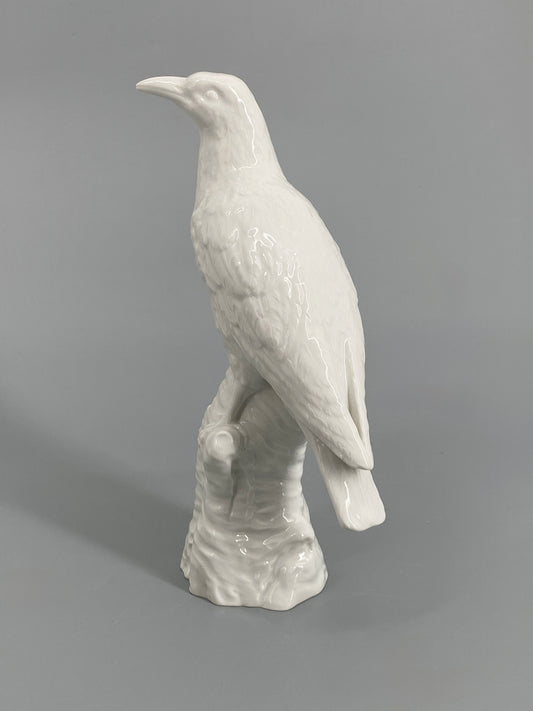 Porzellanvogel "Pirol" von KPM mit weißer Grundglasur, bezeichnet, 1. Wahl