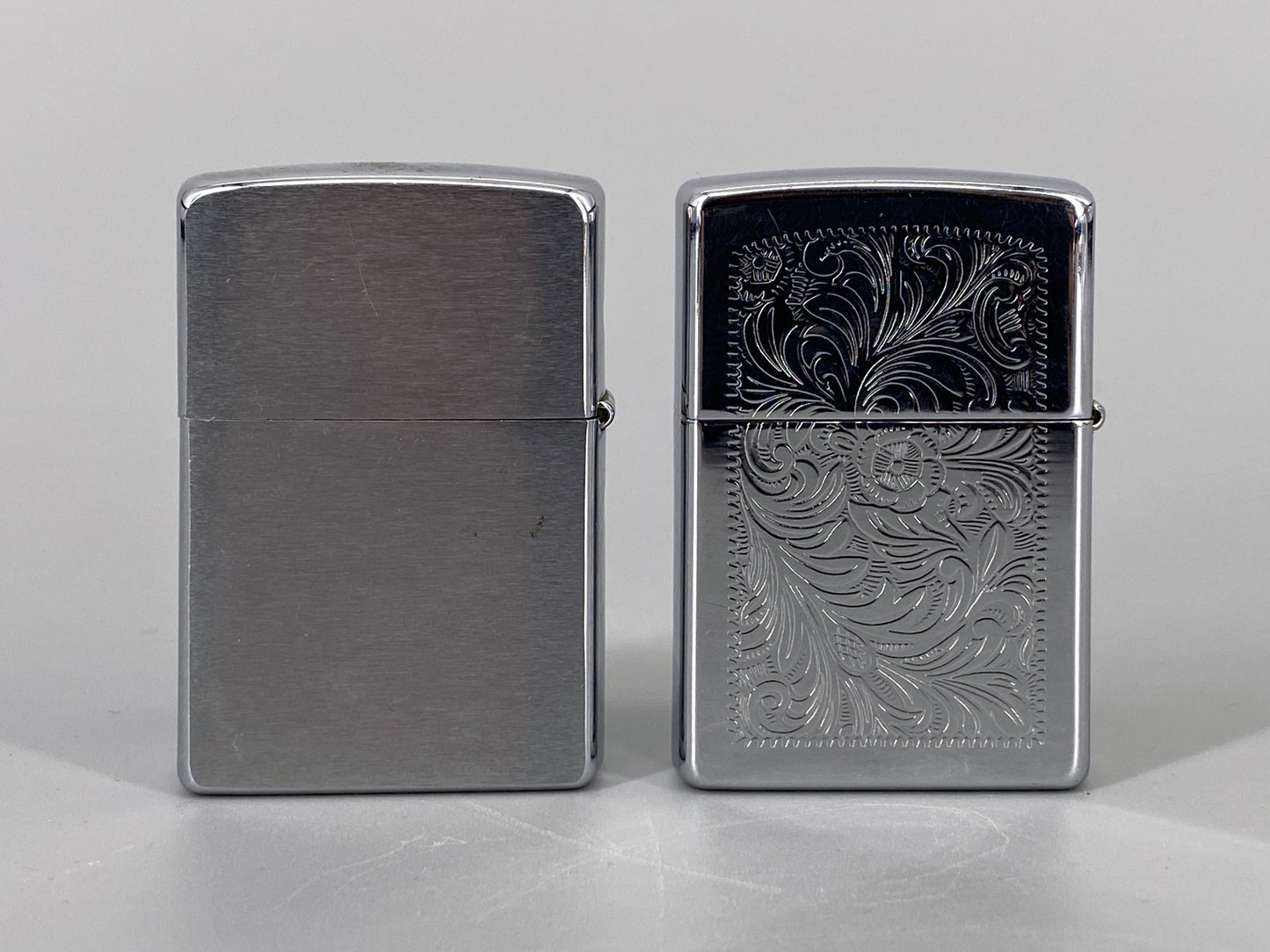 2 Zippo Benzinfeuerzeuge, "Marlboro" und "For Real"