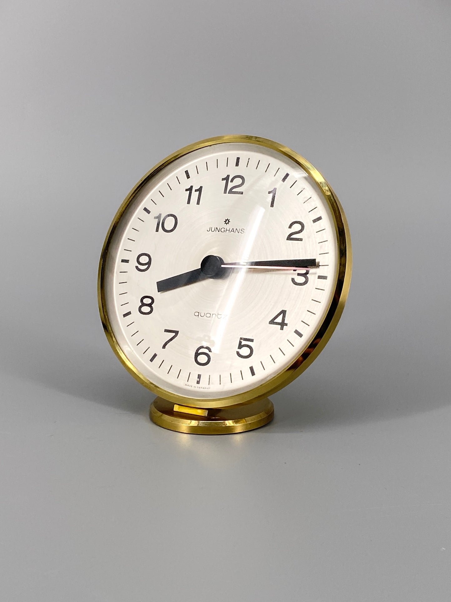 goldene, runde Tischuhr von Junghans, Quartz Uhrwerk, 70er