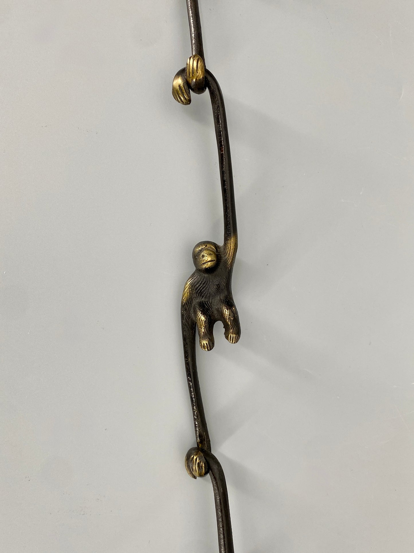 Messinghaken im Affendesign, 50er