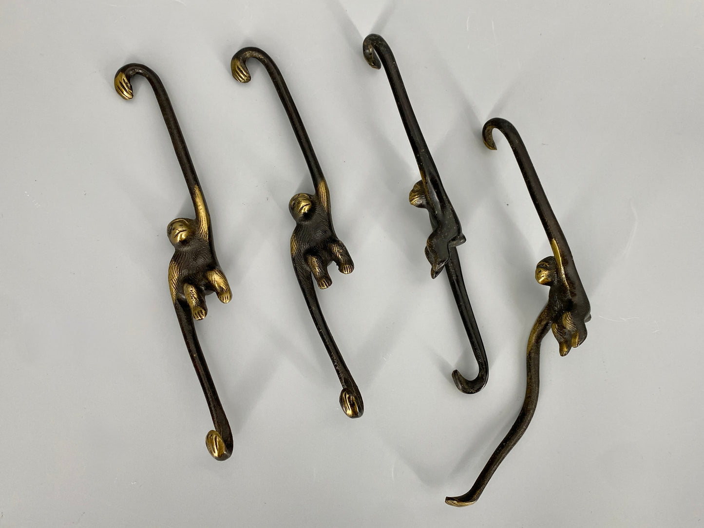Messinghaken im Affendesign, 50er