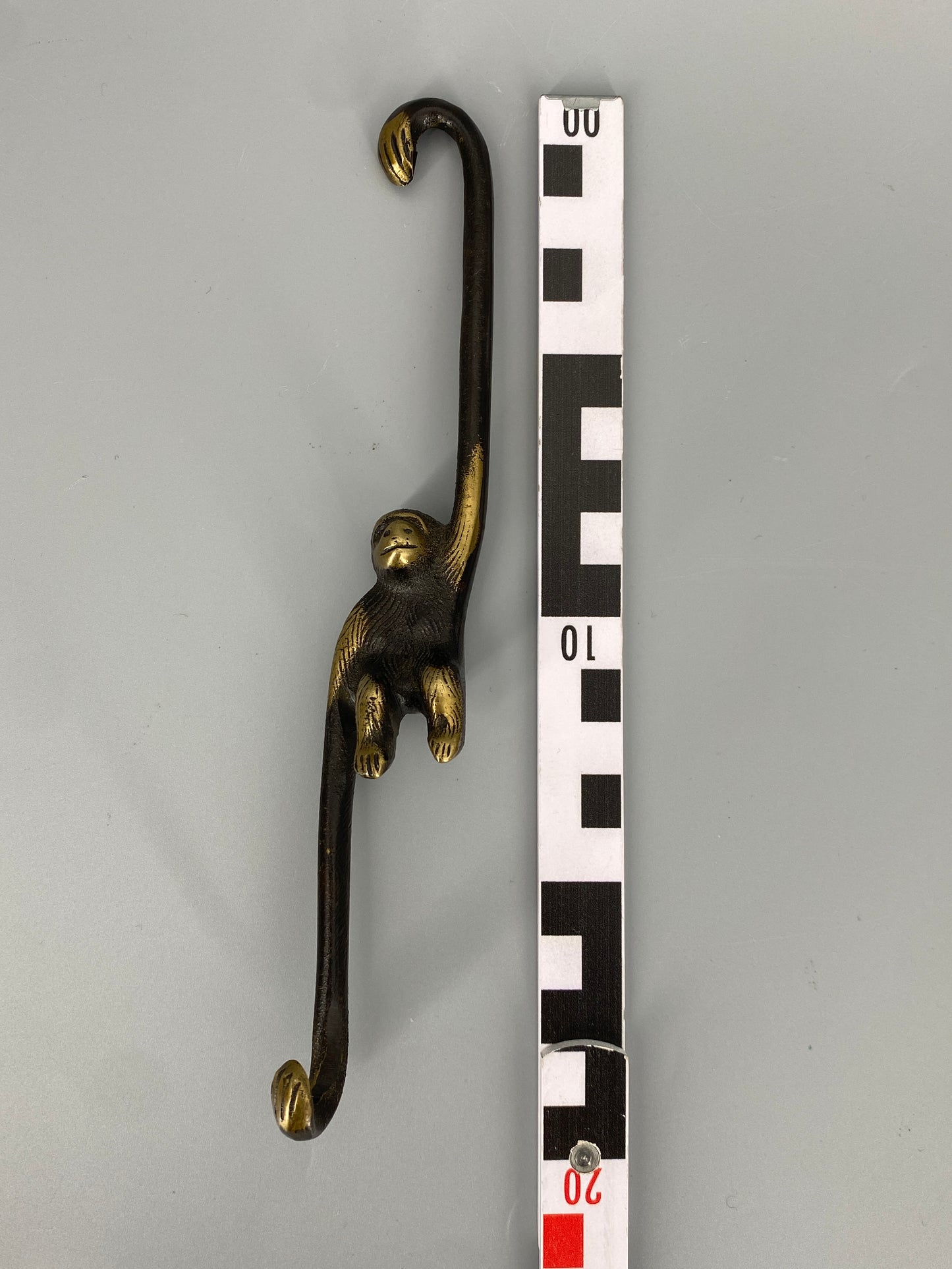 Messinghaken im Affendesign, 50er