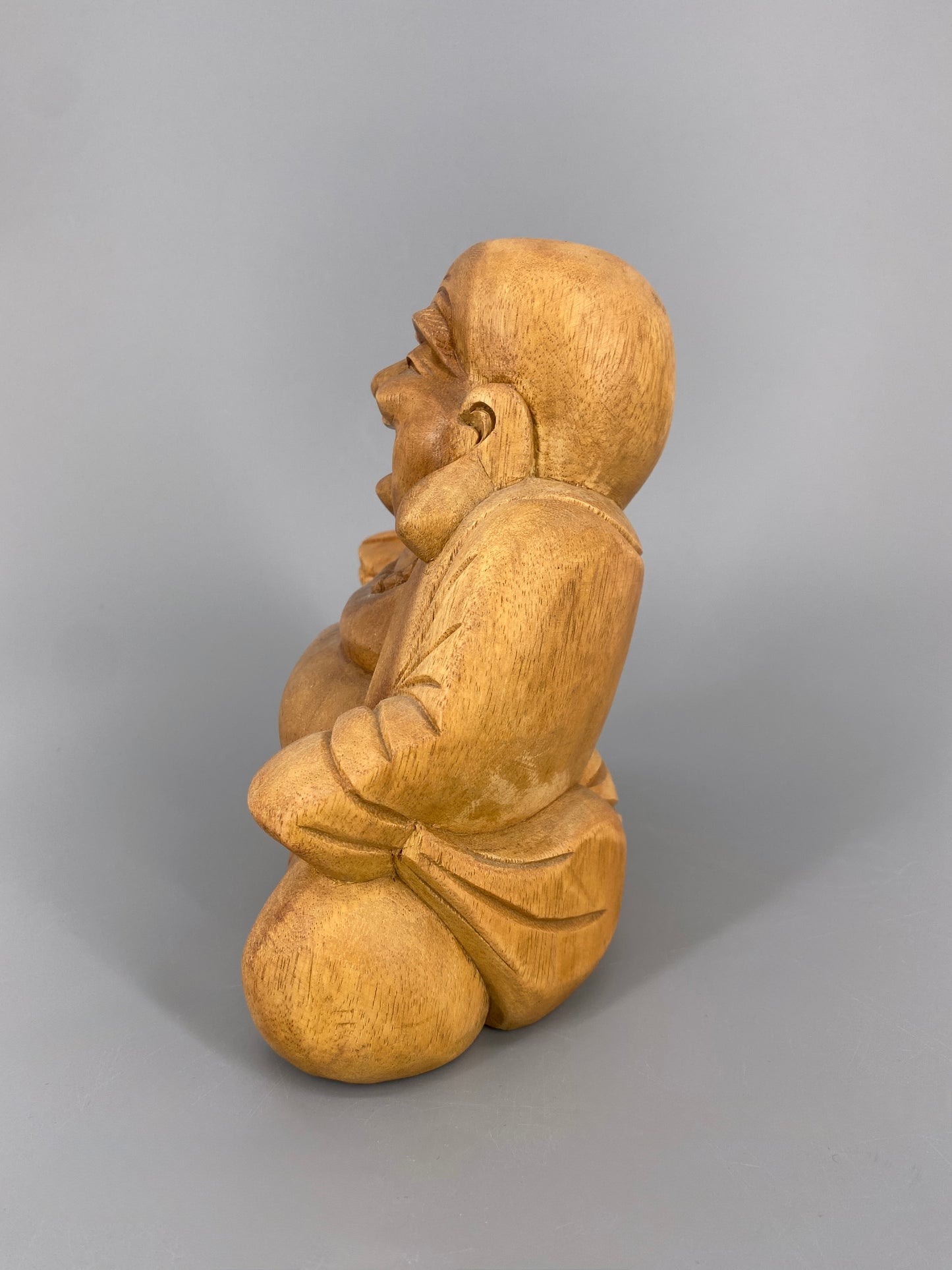 Handgeschnitzte Figur vom lachenden Buddah