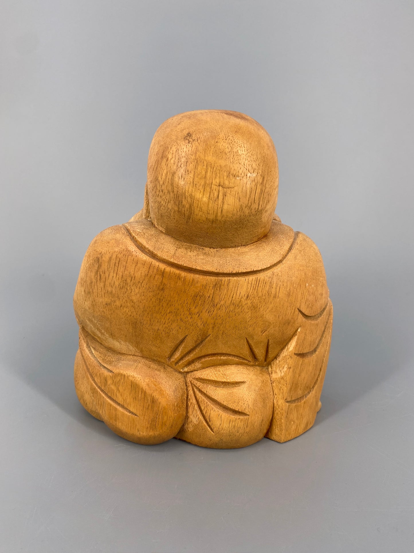 Handgeschnitzte Figur vom lachenden Buddah