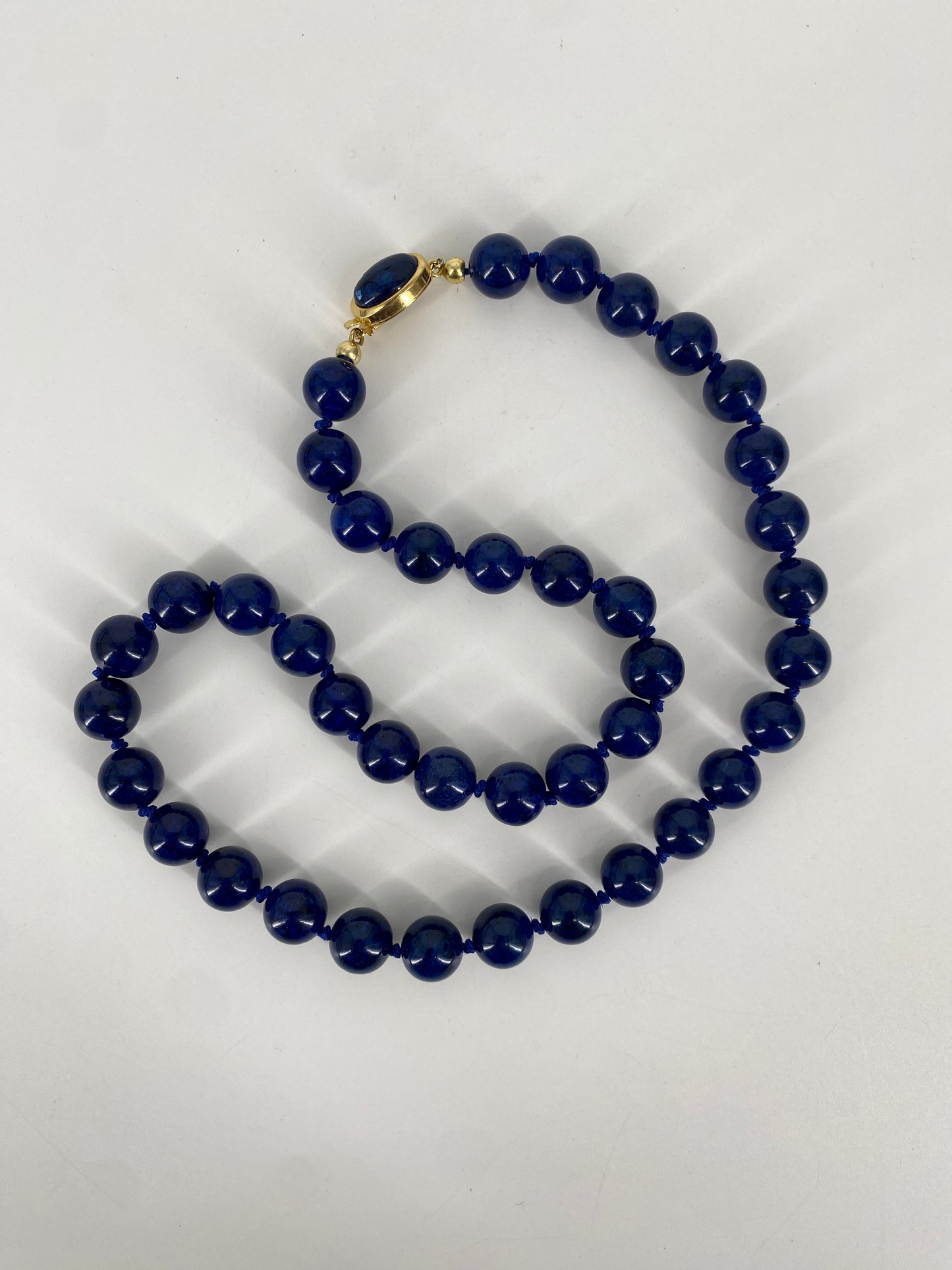 Konvolut von Perlenketten in grün, blau und schwarz