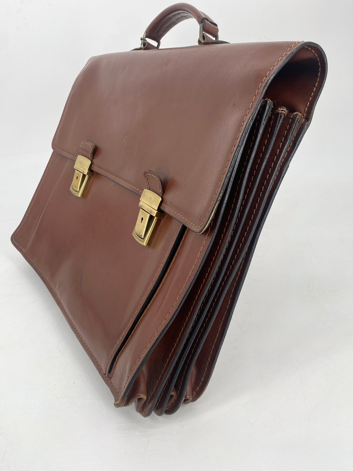 Leder- und Aktentasche, hochwertig. Verschliessbar, mit Tragegriff und vielen Taschen.