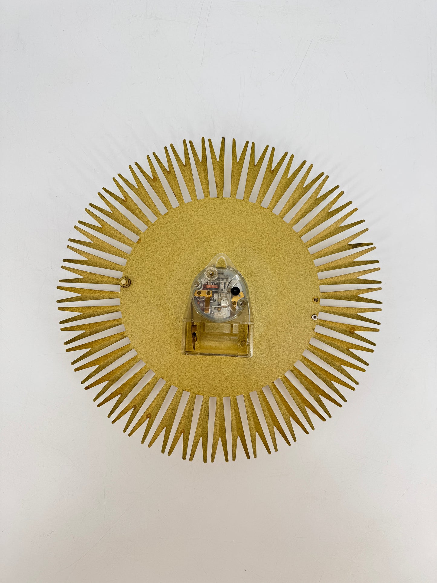 Eine Sunburst Wanduhr von Richter Electric aus Messing, Deutschland 60er Jahre