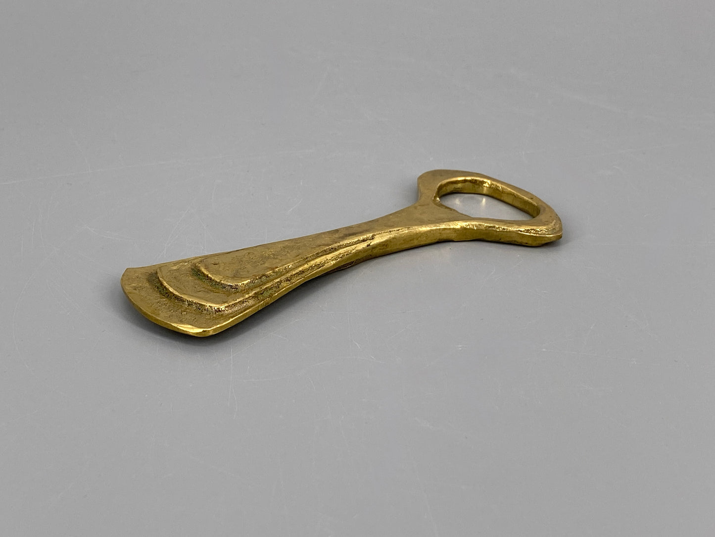 vintage Flaschenöffner aus massivem Messing