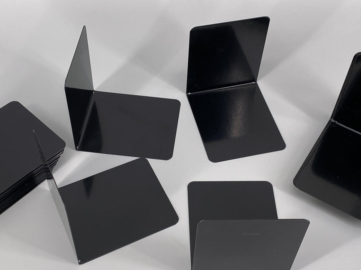 59 schwarze Buchstützen aus Metall von Maul
