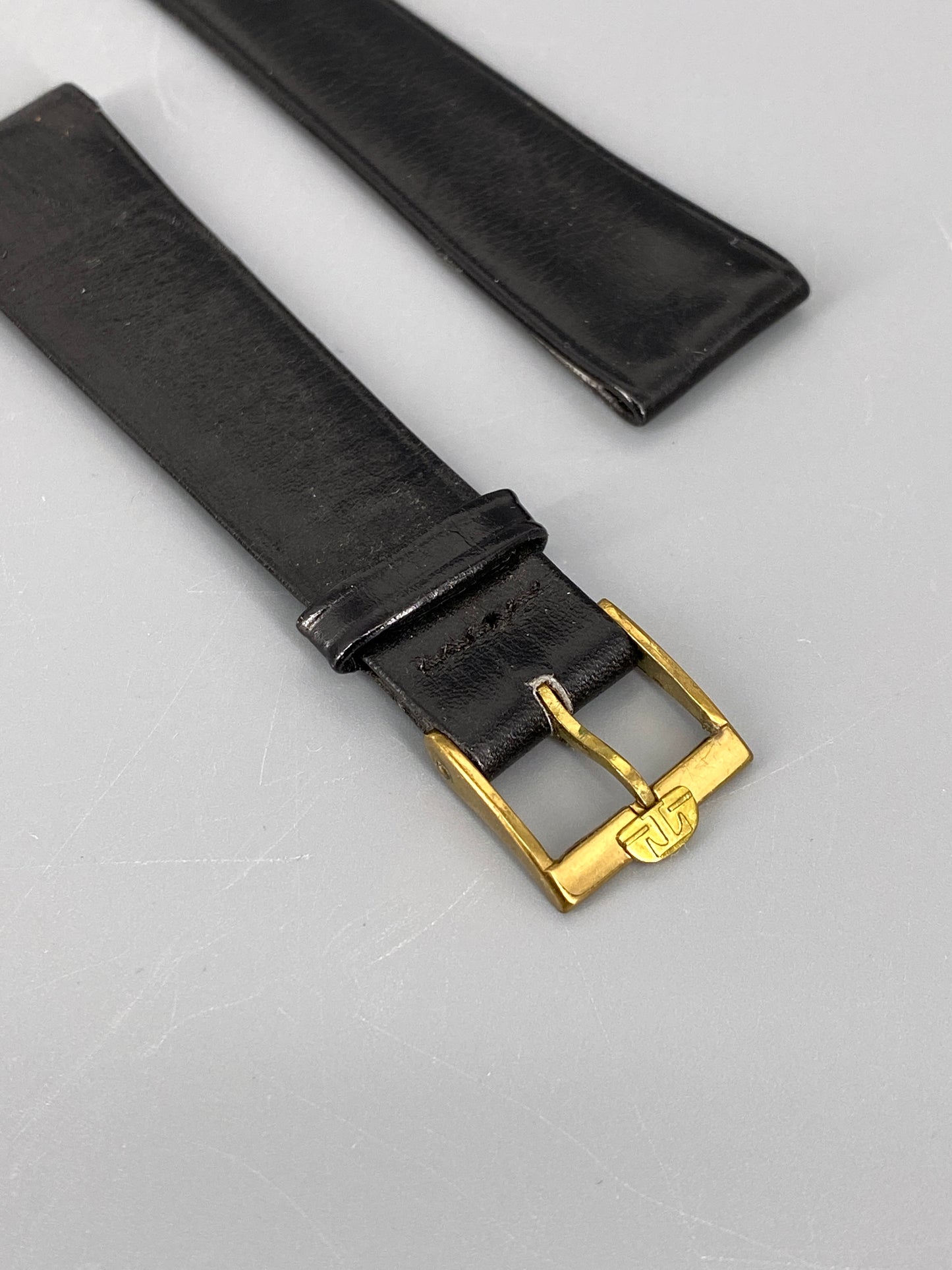 Armband von Tissot aus schwarzem Leder, Schweiz, 80er