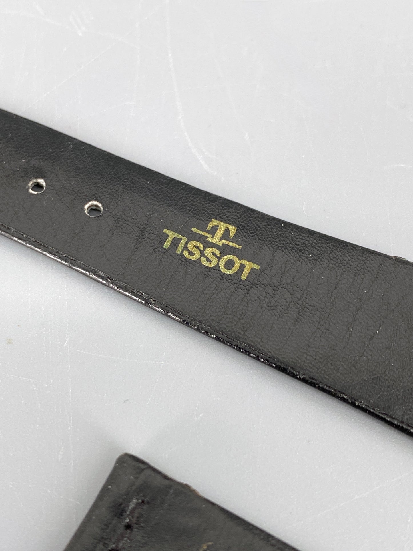 Armband von Tissot aus schwarzem Leder, Schweiz, 80er