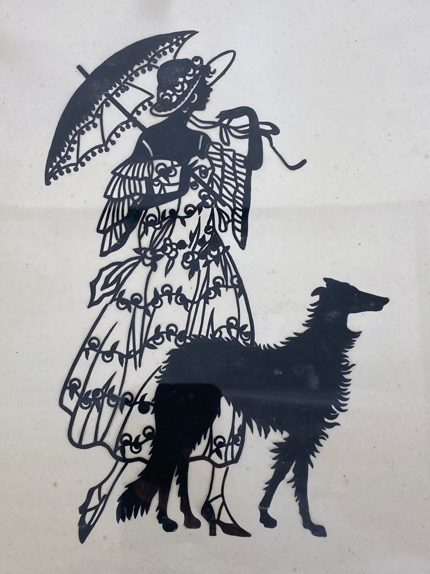 Scherenschnitt von einer Frau mit Hund, 20. Jh.