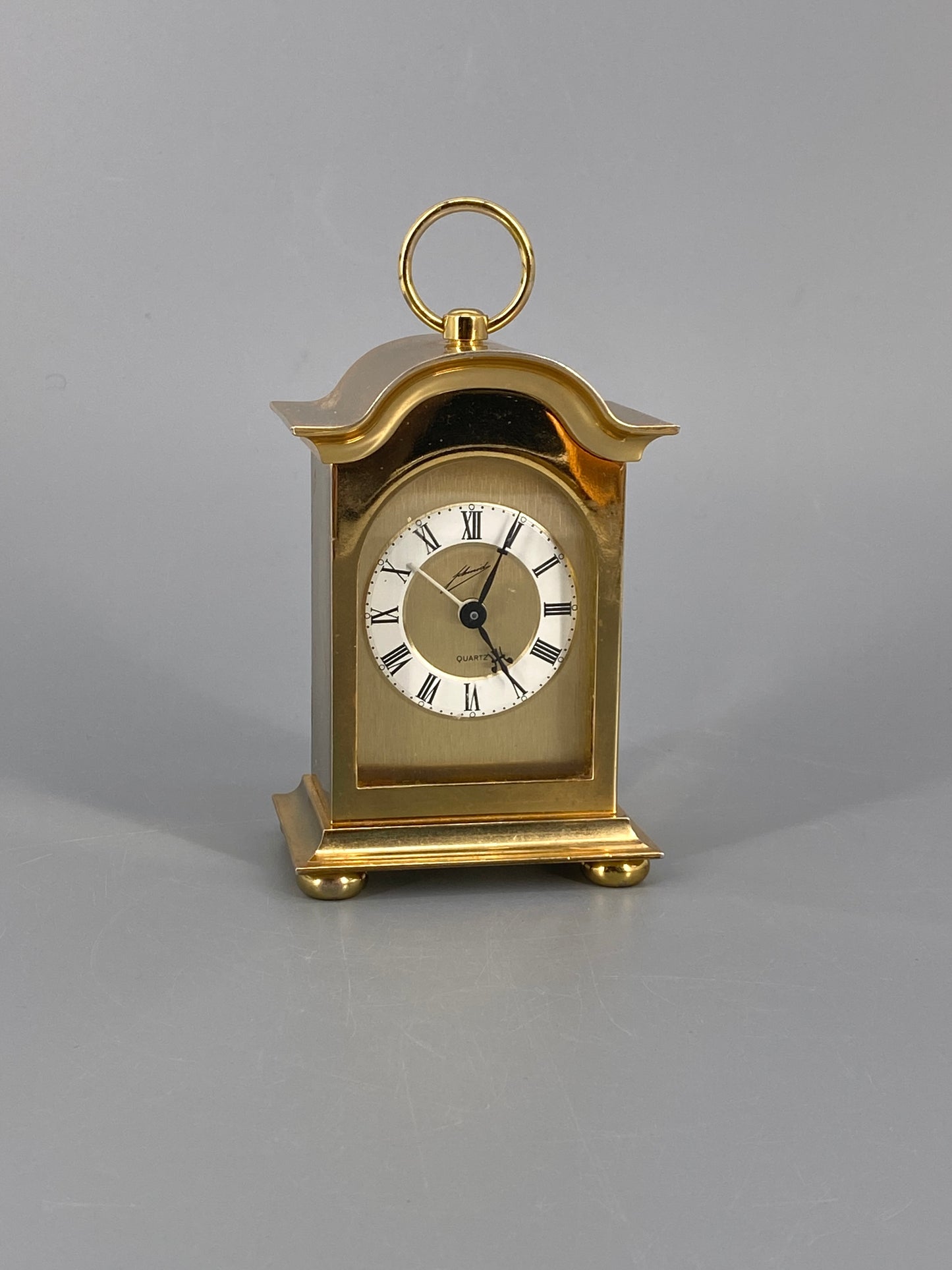 Goldene Quartz Tischuhr von Schmid mit Tragegriff