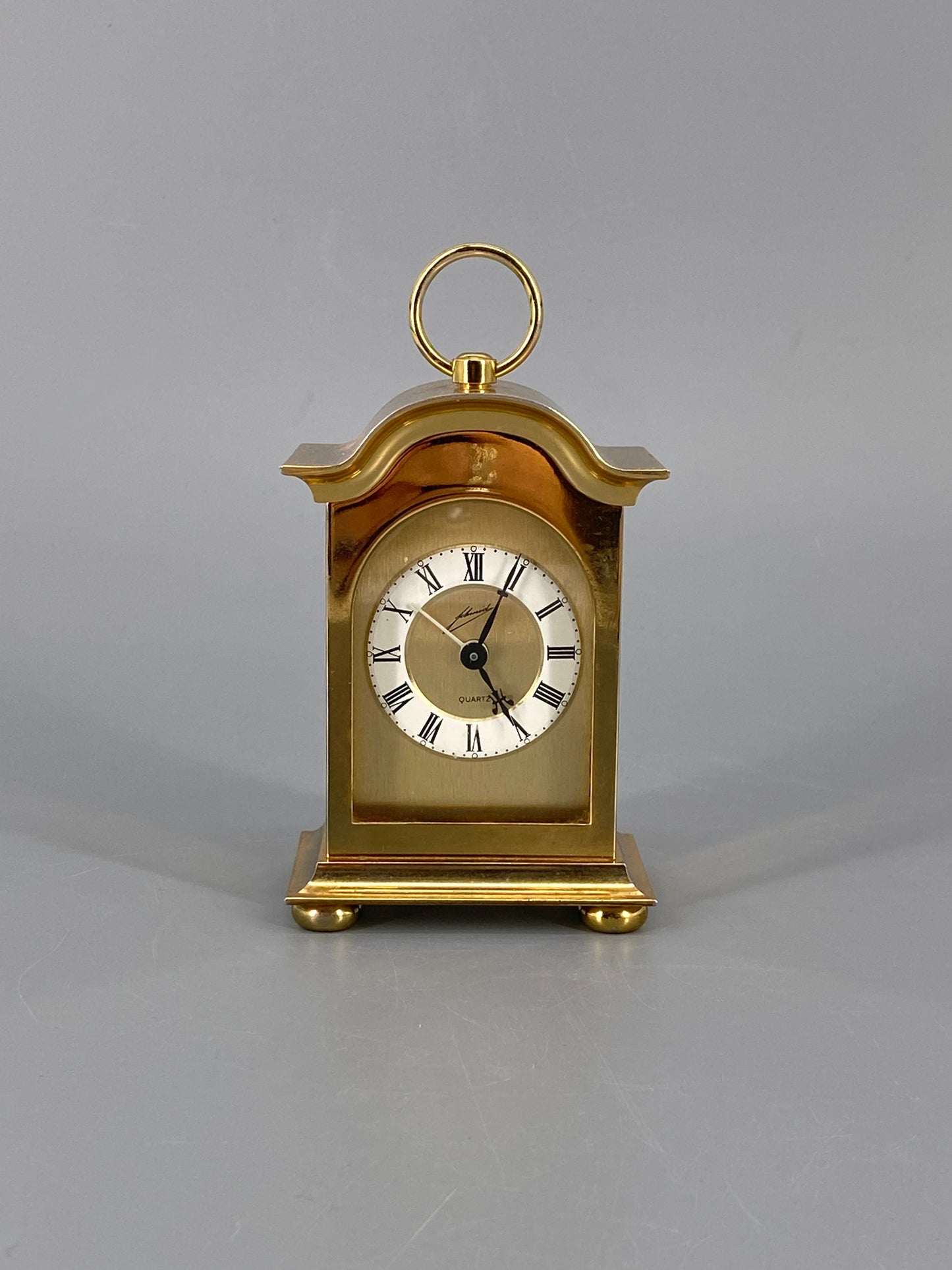 Goldene Quartz Tischuhr von Schmid mit Tragegriff