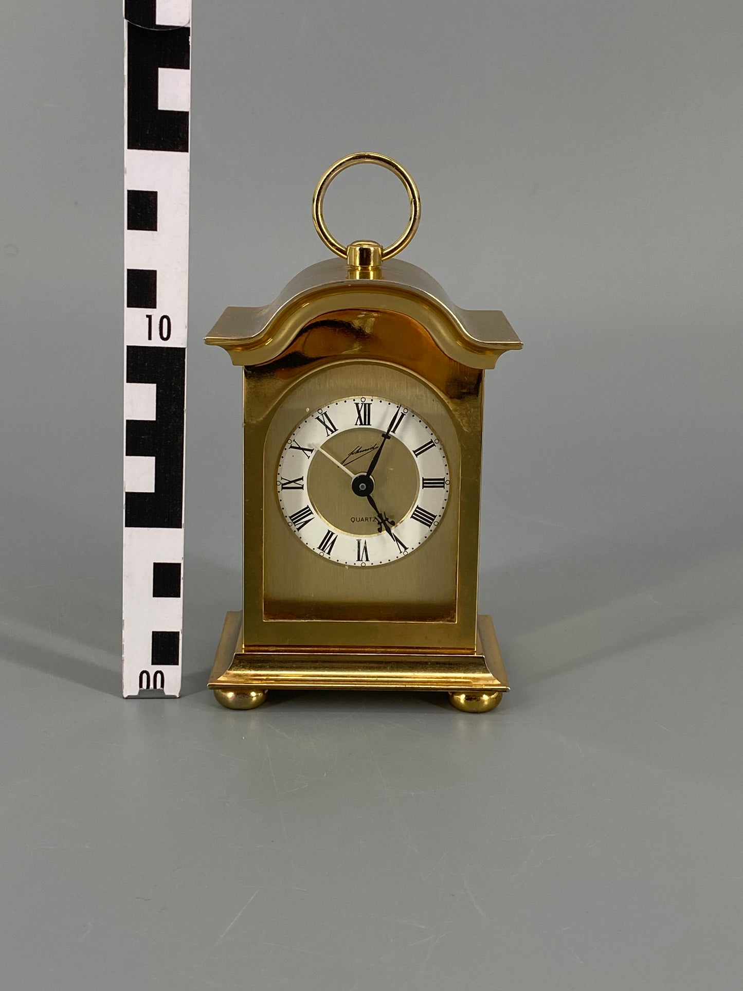 Goldene Quartz Tischuhr von Schmid mit Tragegriff